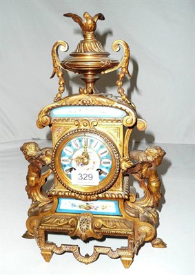 Lot 329 - French gilt metal porcelain mounted clock