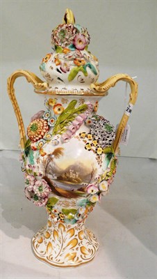 Lot 336 - A 19th century flower encrusted topographical two handled vase