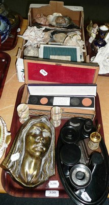 Lot 338 - A box of mineral specimens, fossils and shells and a tray of ornamentals including a brass mask...