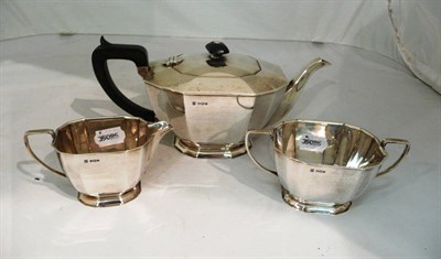 Lot 353 - A silver three piece tea service, Sheffield 1961