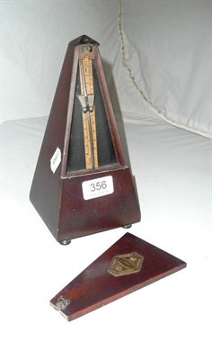 Lot 356 - A French walnut metronome