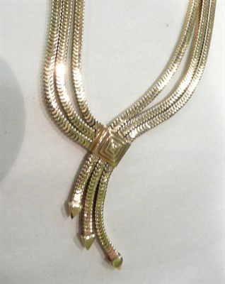 Lot 372 - A 9ct gold three strand necklace, 64g approximate weight