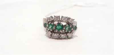 Lot 375 - An 18ct white gold emerald and diamond ring