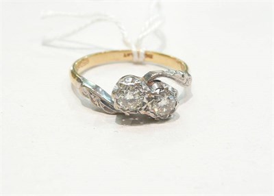 Lot 412 - A diamond two stone ring