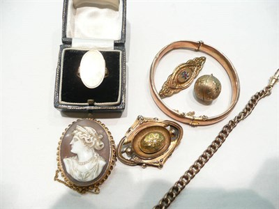 Lot 417 - A 9cat gold curb link chain; a 9ct gold orb locket pendant; a 9ct gold locket ring; a 9ct gold...