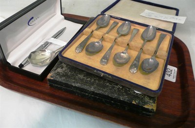 Lot 432 - A silver caddy spoon, cased silver spoons, cross, pen, etc