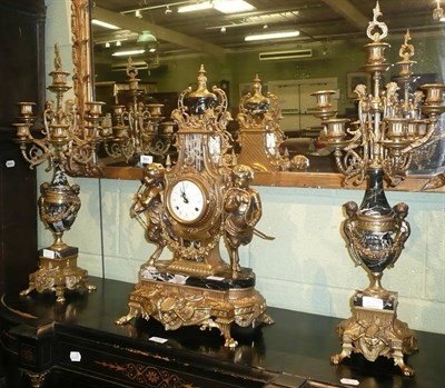 Lot 451 - Gilt metal and marble clock garniture