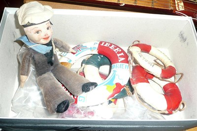 Lot 481 - A Nora Wellings sailor doll, five life rings