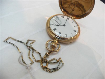 Lot 482 - A 9ct gold pocket watch on a two colour chain