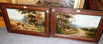 Lot 510 - A pair of oil paintings by H Livens - 'A Lane in Dorking' and 'A Cornfield in Shere' (2)