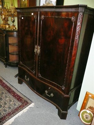 Lot 566 - Mahogany Serpentine wardrobe