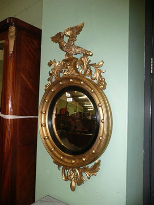 Lot 575 - A gilt mirror