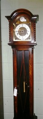 Lot 580 - An oak grandmother clock with glazed trunk door