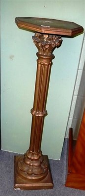 Lot 585 - A giltwood cluster column torchere