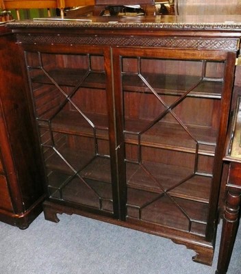 Lot 590 - Early 20th century mahogany display cabinet