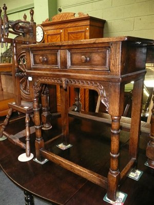 Lot 595 - 18th century style small oak lowboy