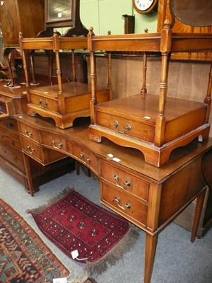 Lot 597 - A pair of yew wood bedside tables and a dressing table