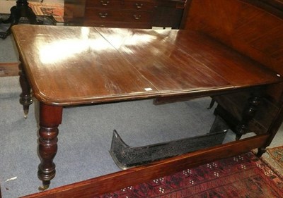 Lot 605 - A mahogany dining table