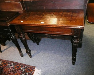 Lot 628 - 19th century oak fold-over card table with parquetry top