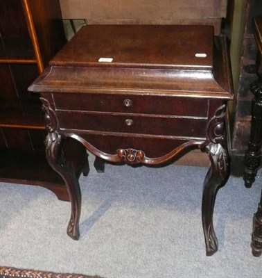 Lot 629 - A 19th century Continental walnut sarcophagus-top sewing table