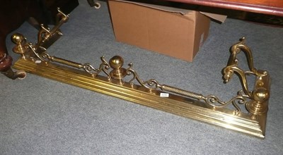 Lot 636 - Georgian-style brass fender