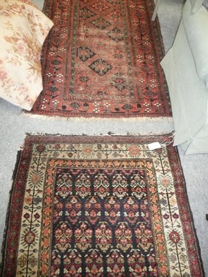 Lot 647 - Kurdish runner, North West Persian Kurdistan, the field with columns of boteh and a Balouch rug (2)