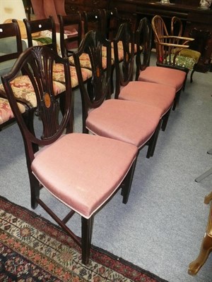 Lot 649 - A set of four mahogany Hepplewhite-style dining chairs