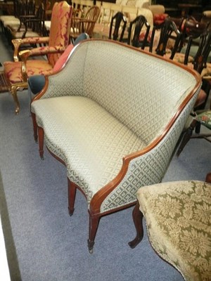 Lot 651 - An Edwardian walnut-framed, tub-shaped two seater settee