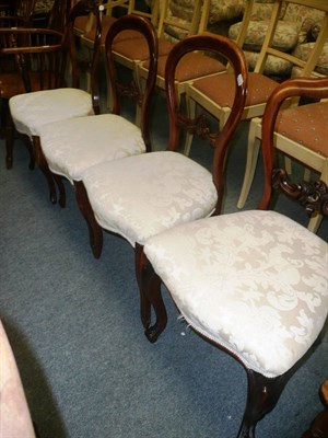 Lot 663 - Set of three Victorian walnut balloon-back salon chairs and a similar rosewood chair