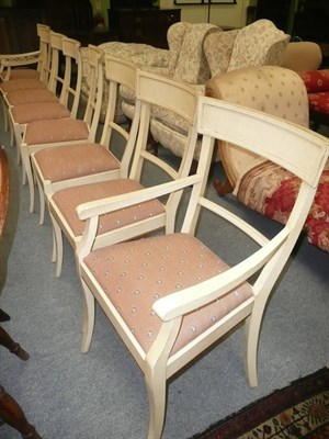 Lot 665 - A set of eight (6+2 elbow) white painted chairs