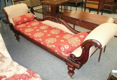 Lot 669 - Victorian carved mahogany scroll-end settee