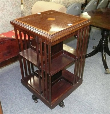 Lot 671 - Edwardian inlaid mahogany revolving bookcase