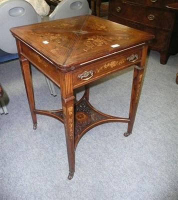 Lot 673 - Edwardian rosewood inlaid envelope table