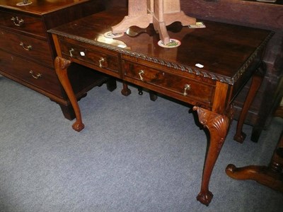 Lot 688 - Chippendale-style mahogany two drawer side table