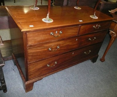 Lot 690 - Georgian mahogany dwarf three height chest