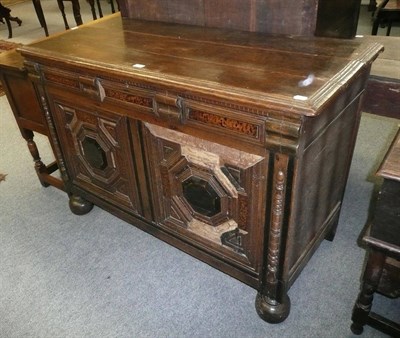 Lot 692 - 17th century oak linen chest with geometric double panel fascia