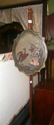 Lot 709 - A 19th century mahogany pole screen with bird-painted banner