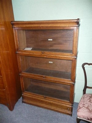 Lot 728 - A Globe Wernicke oak bookcase