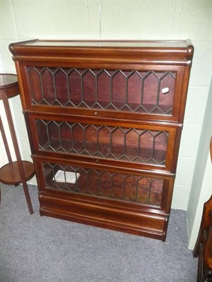 Lot 734 - A pair of mahogany stacking bookcases with leaded glazed doors