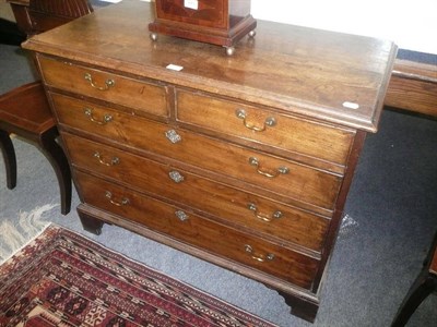 Lot 757 - A George III mahogany straight front chest of drawers