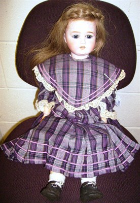 Lot 1010 - Schoneau & Hoffmeister Bisque Socket Head Doll impressed 1909 6, with a later brown plaited...