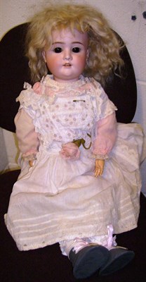 Lot 1013 - Schoneau & Hoffmeister Bisque Socket Head Doll impressed 1906 with original blond wig, sleeping...