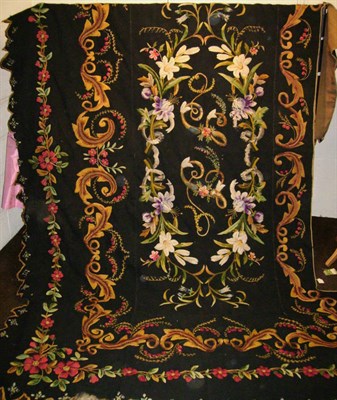 Lot 1038 - Late 19th Century Panelled Wool And Silk Embroidered Hanging with a scalloped edge to three...