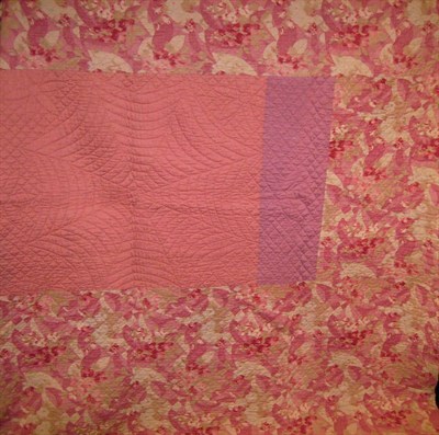 Lot 1043 - Pink And Floral Reversible Quilt and a blue and yellow quilt with scalloped designs (2).