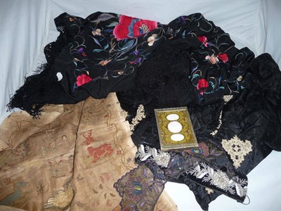 Lot 1079 - A Georgian Needlework Sampler (unframed a.f.); a Victorian black satin bodice with lace...