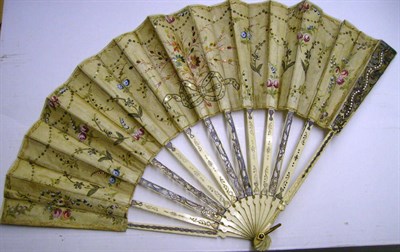 Lot 1113 - Eighteenth Century Pierced Ivory Fan inlaid with pearls to the guards, with a guaze mount...