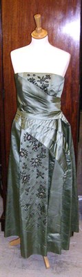 Lot 1125 - Circa 1950's Pale Green Satin Strapless Evening Dress with beaded  detailing and a pair of matching