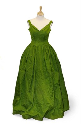 Lot 1126 - Circa 1950's Green Silk Evening Gown with fitted bodice and full skirt labelled 'Chanelle',...