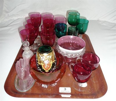 Lot 3 - A tray of coloured glass including a set of nine cranberry wines, two custard cups, two bowls,...
