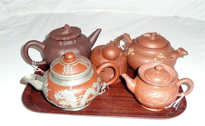 Lot 19 - Five Yixing stoneware teapots (5)